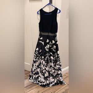 Blue and white formal dress with mesh mid-drift, and pockets. Size 4
